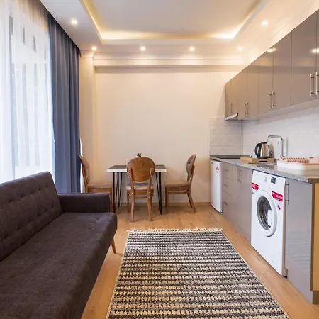 Tanrise House 아파트호텔 페티예